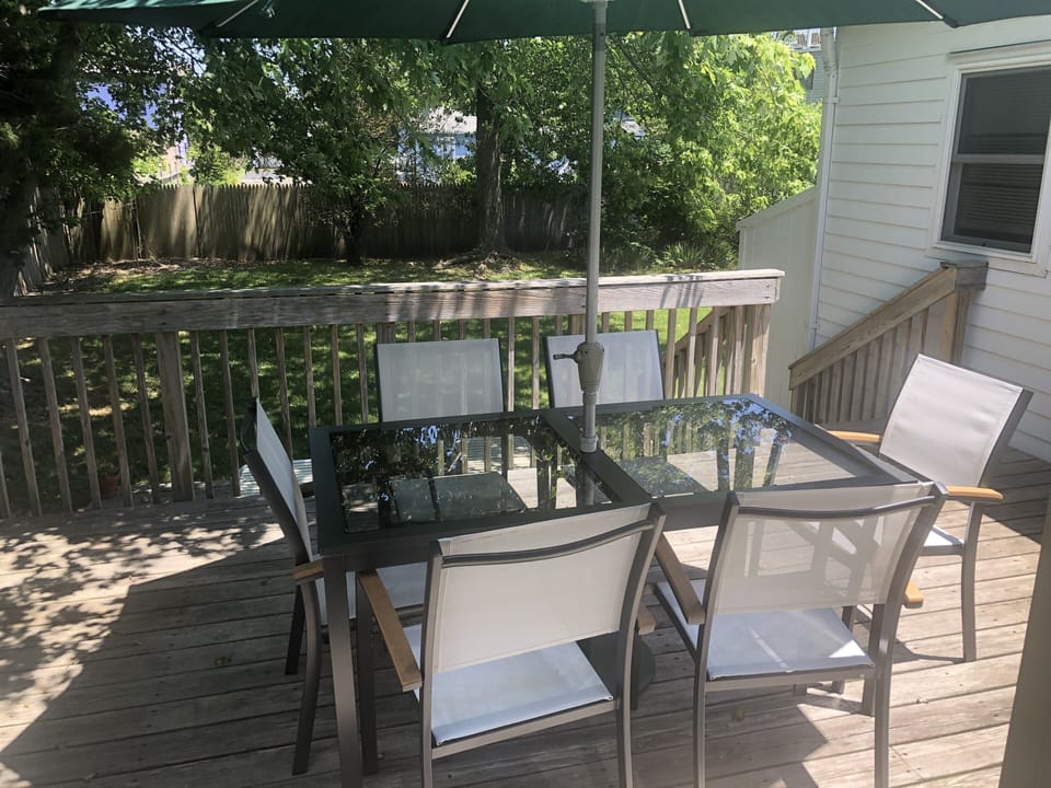 Beautiful shaded backyard, completely fenced in. You and your pup will love it.