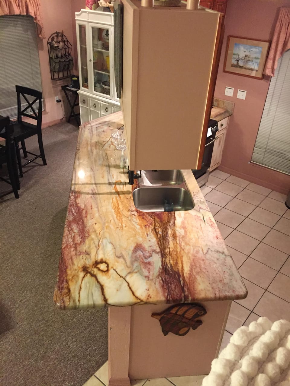 Kitchen has custom granite throughout 