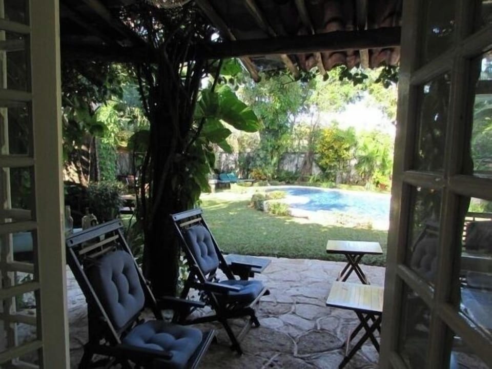Beautiful local architecture surrounded by a gorgeous garden.