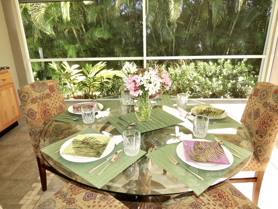 Beautiful outdoor eating area fully screened