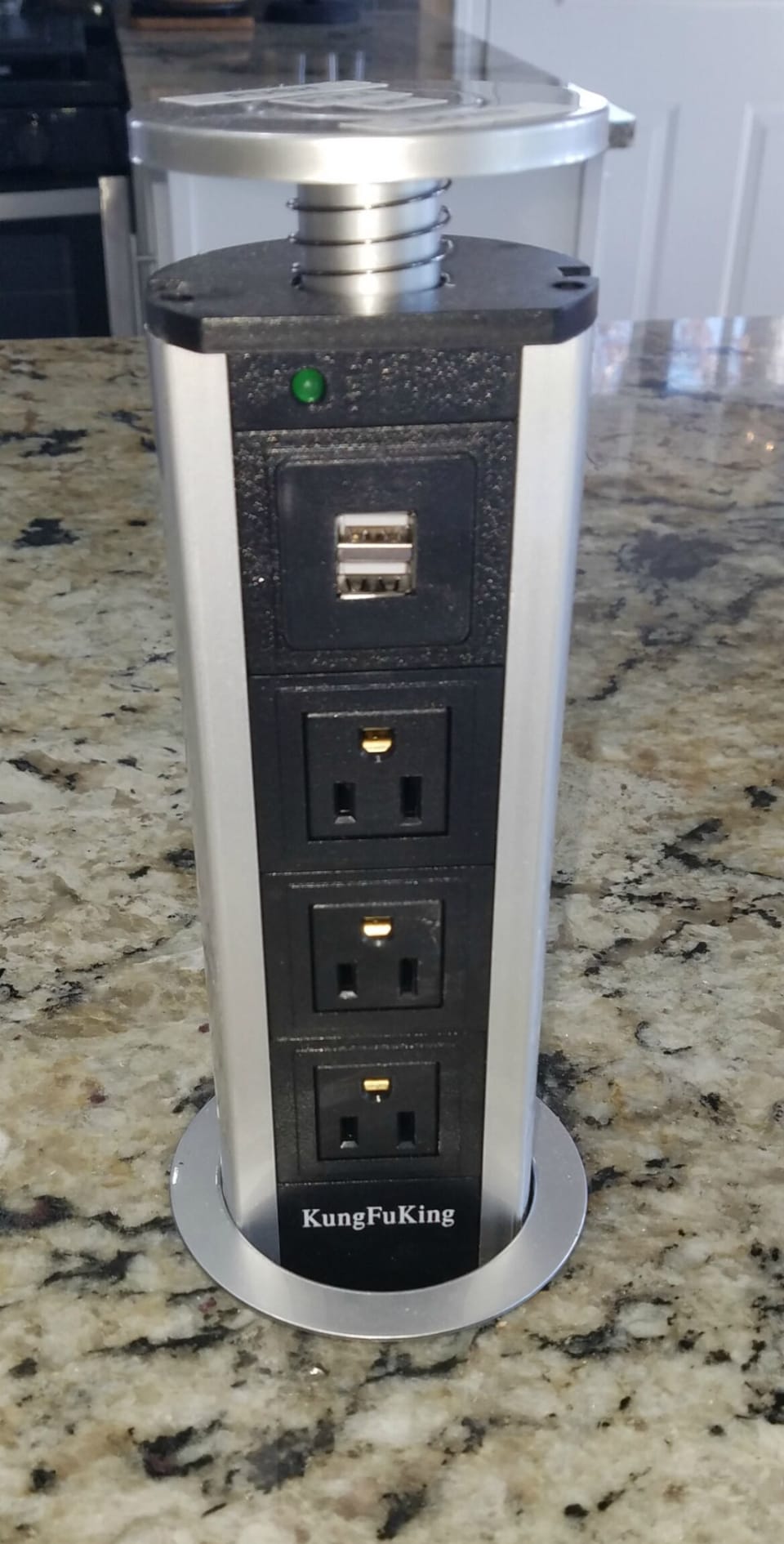 USB and electrical outlets pull up out of counter and back down for convenience