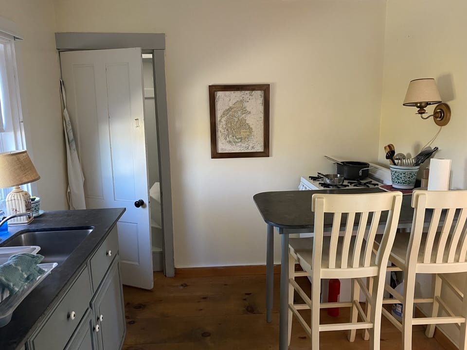 Galley kitchen as seen from downstairs bathroom. 