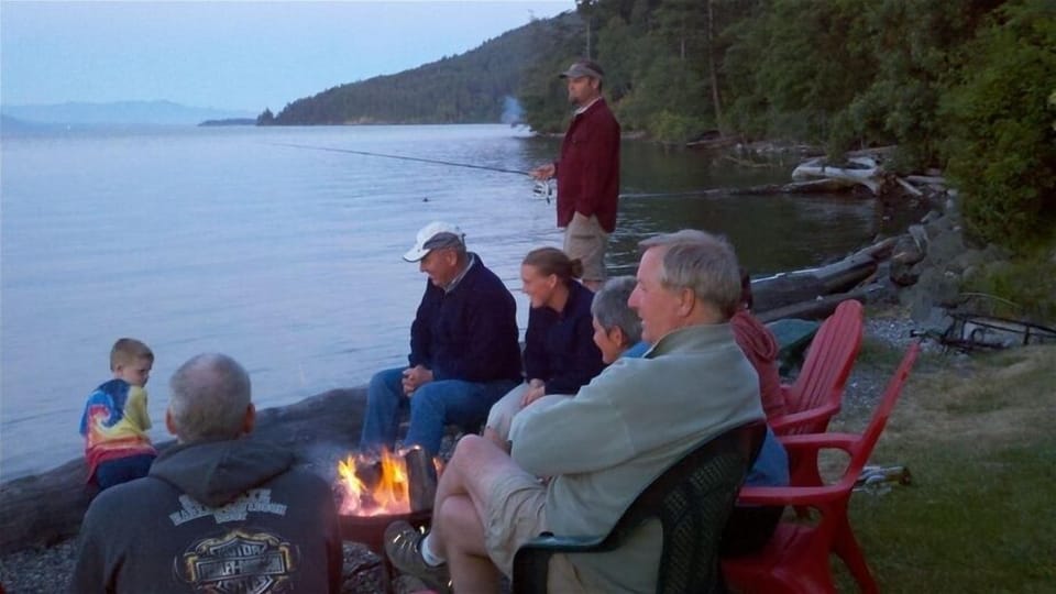 Relaxing and enjoying the evening around the bonfire.