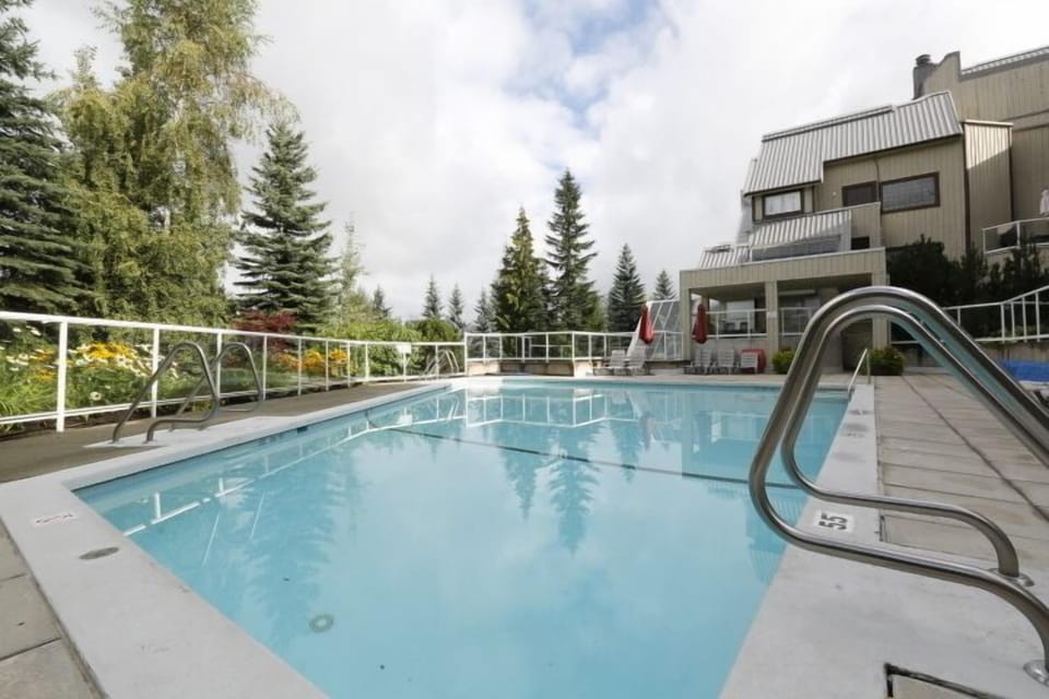 Heated seasonal outdoor pool surrounded by the forest is open mid-May to mid-Oct