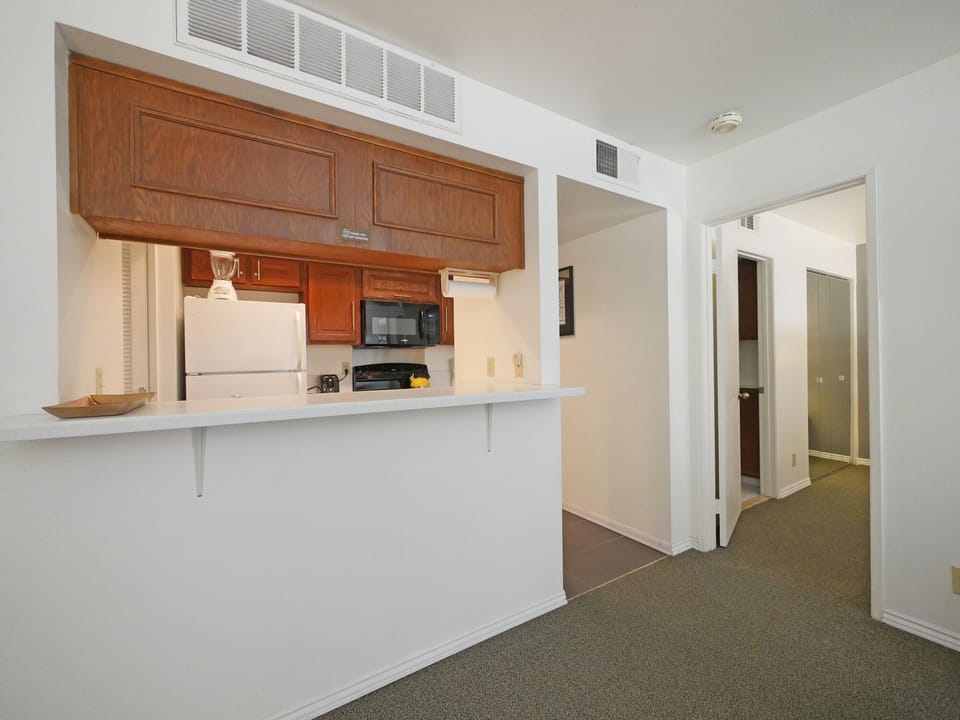 Bar countertop and entrance to bedroom