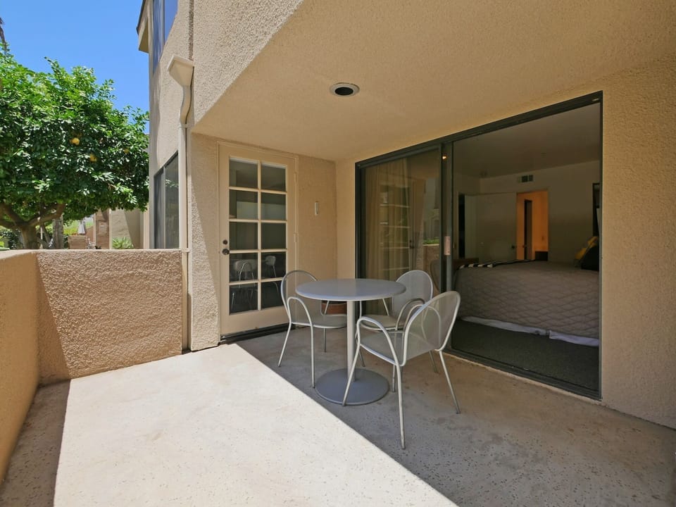 Enter the patio from the living room or bedroom. Relax and read a book or dine!