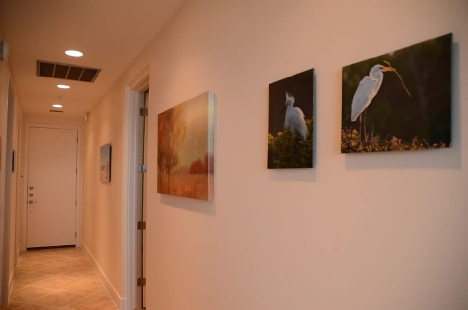 Hallway of unit. Photos by local award-winning photographer throughout the unit.