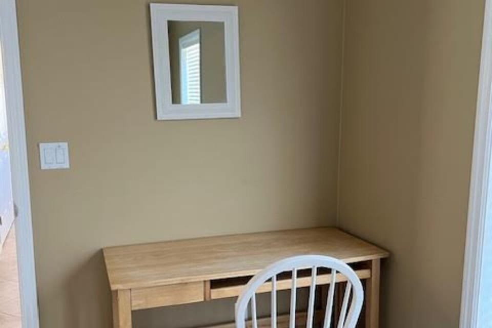 desk and chair in first floor bedroom