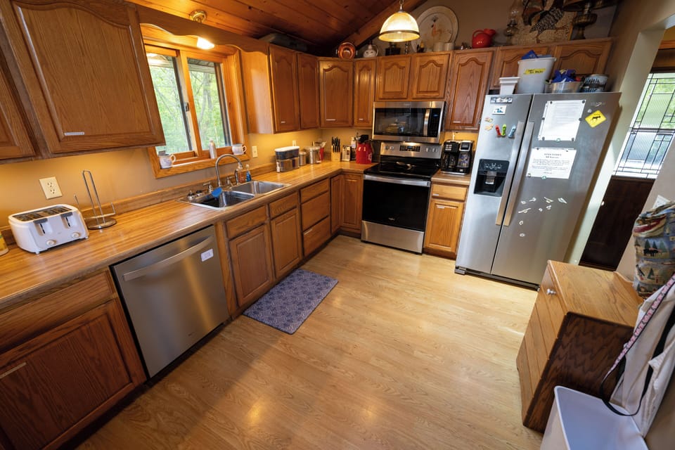 new kitchen appliances srping 2024.  Over range microwave, glass cooktop, fridge