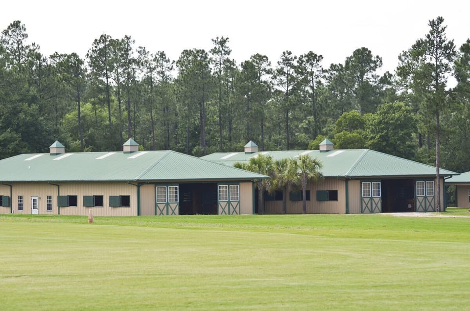 Two 12-stall barns with amenities for your equine partners