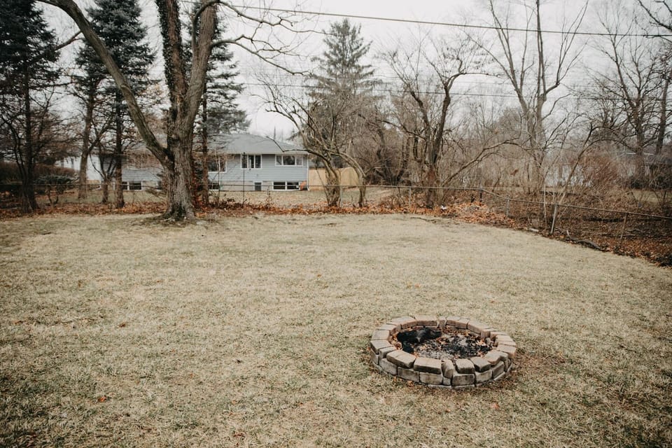 Backyard showing firepit