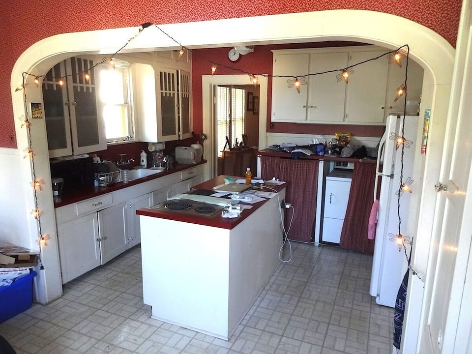 Kitchen; electric stove, dishwasher, old microwave; washer & dryer also in there