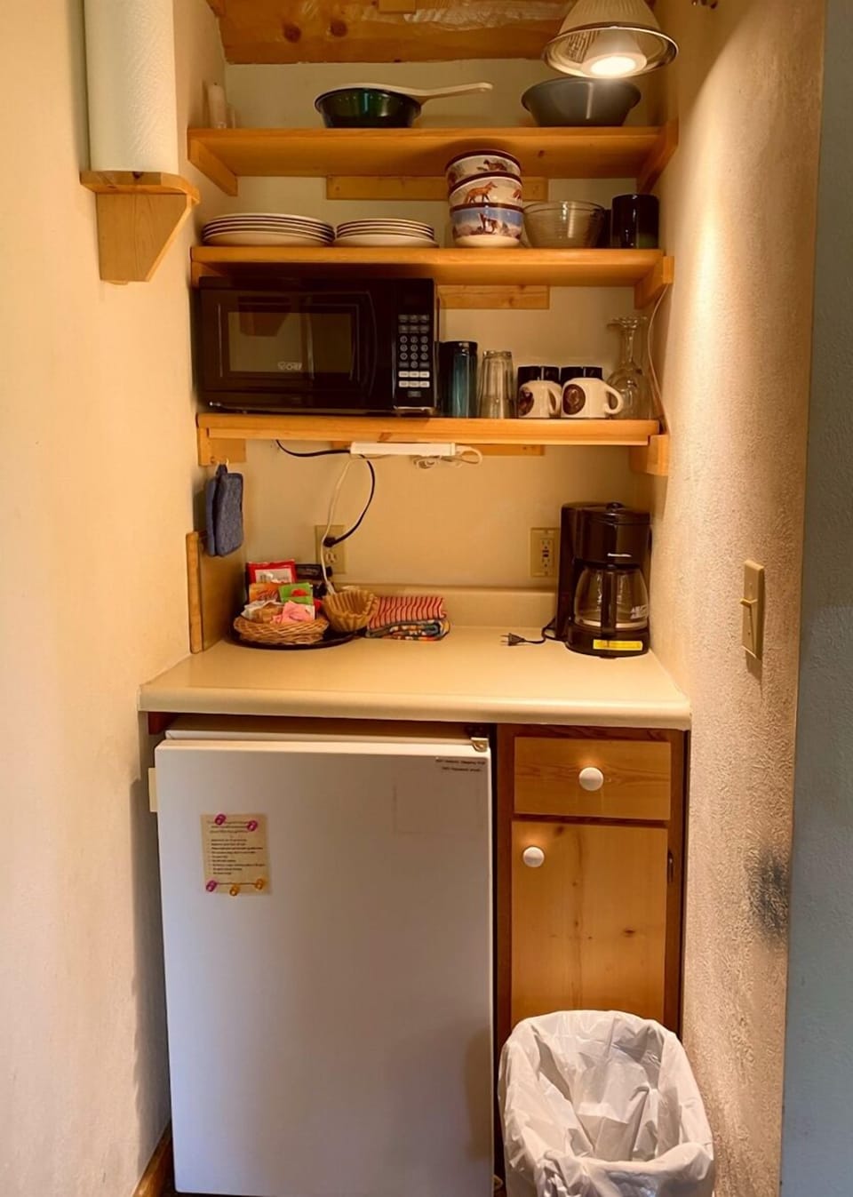Kitchenette amenities include a microwave, fridge and coffee maker