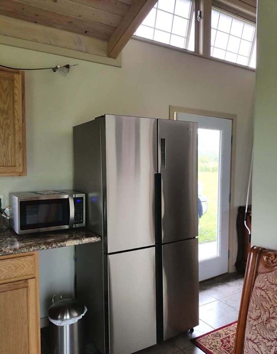 looking at the front entrance from kitchen
