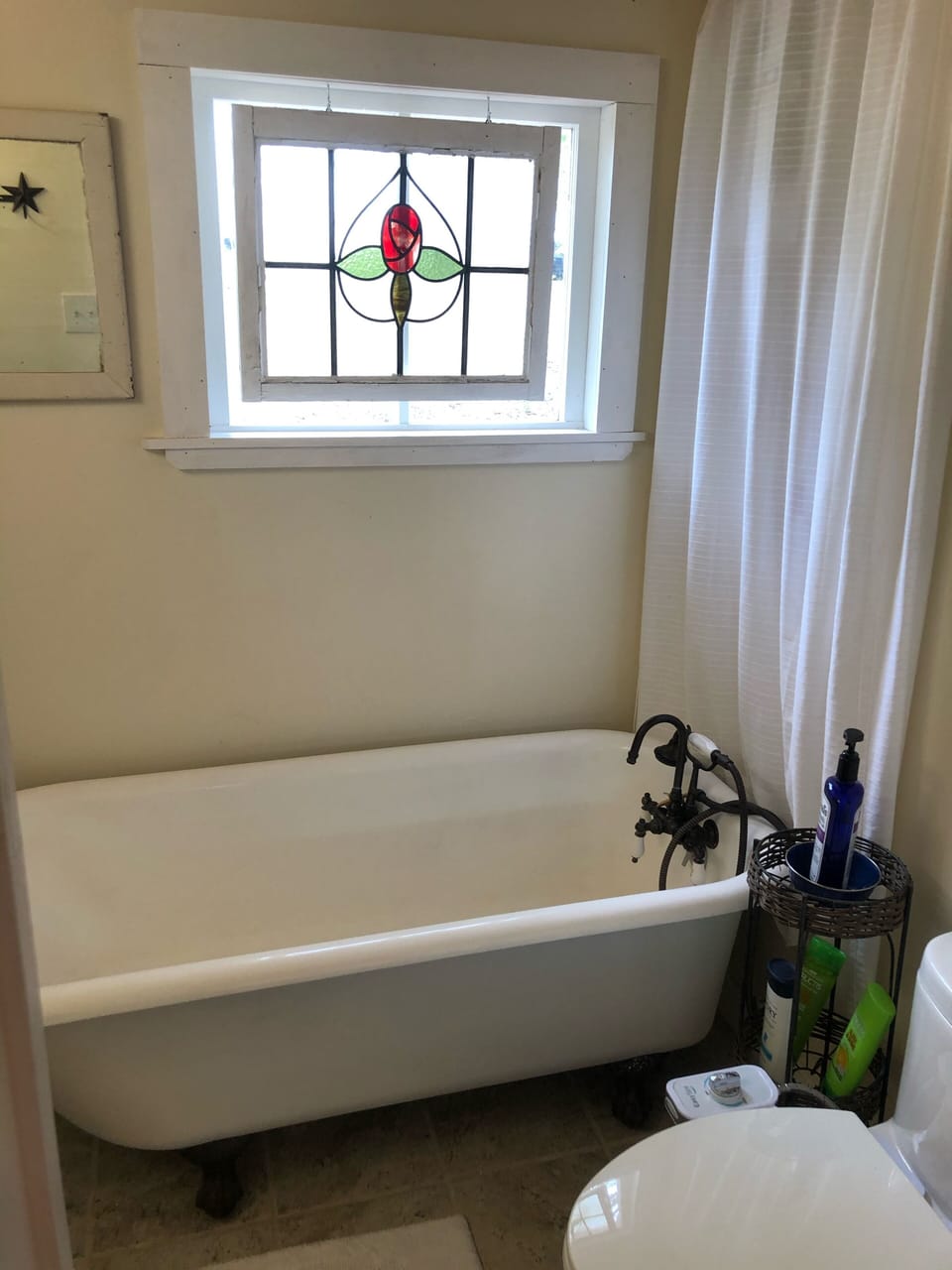 Ball and claw bathtub
