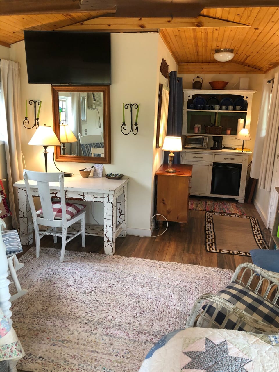 Smart TV and antique cupboard