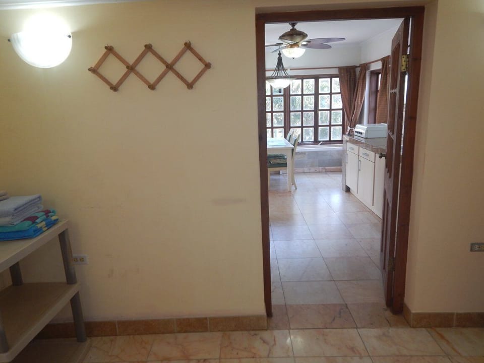 small coridor takes you to the bathroom or additional bedroom