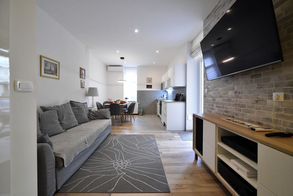 Living area with kitchen and dining area