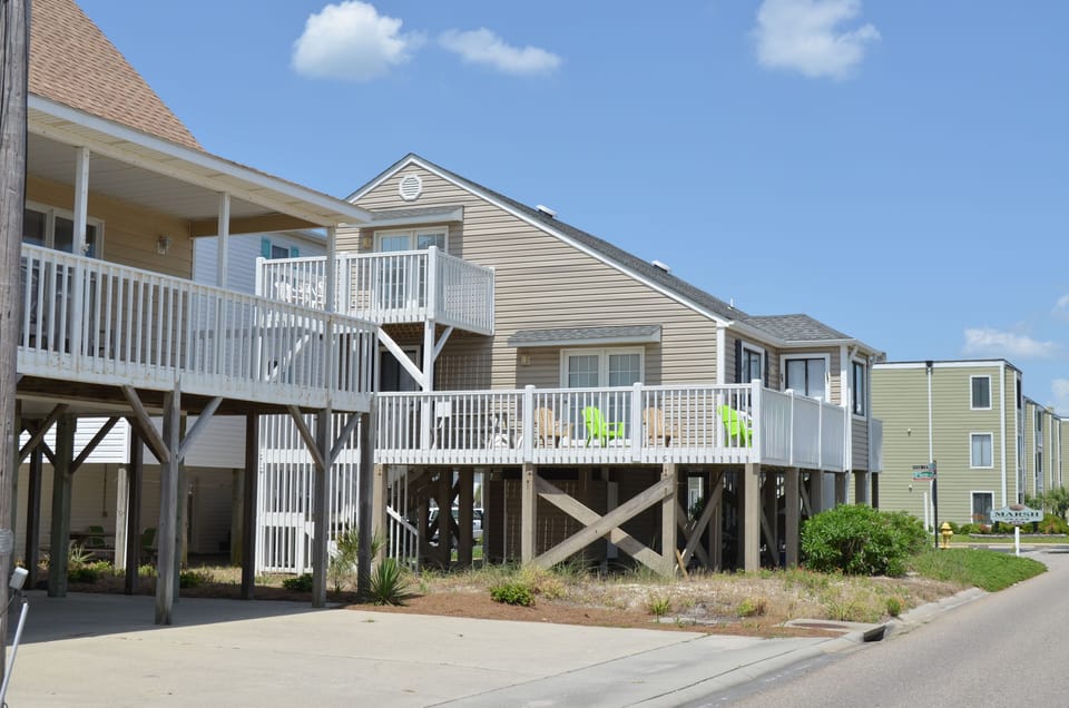 The decked side of the house as you travel down Ocean Blvd.
