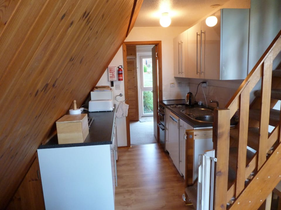 Fully equipped kitchen with dishwasher too. Stair gates at top and bottom.