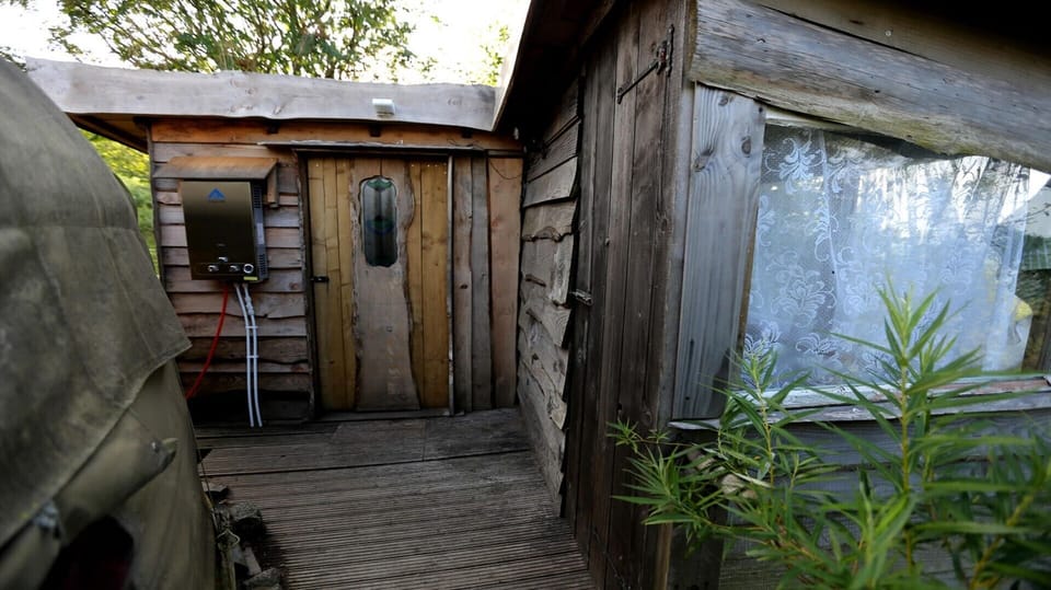 Compost Toilet to the right {H&C water here too!} bathhouse door straight ahead