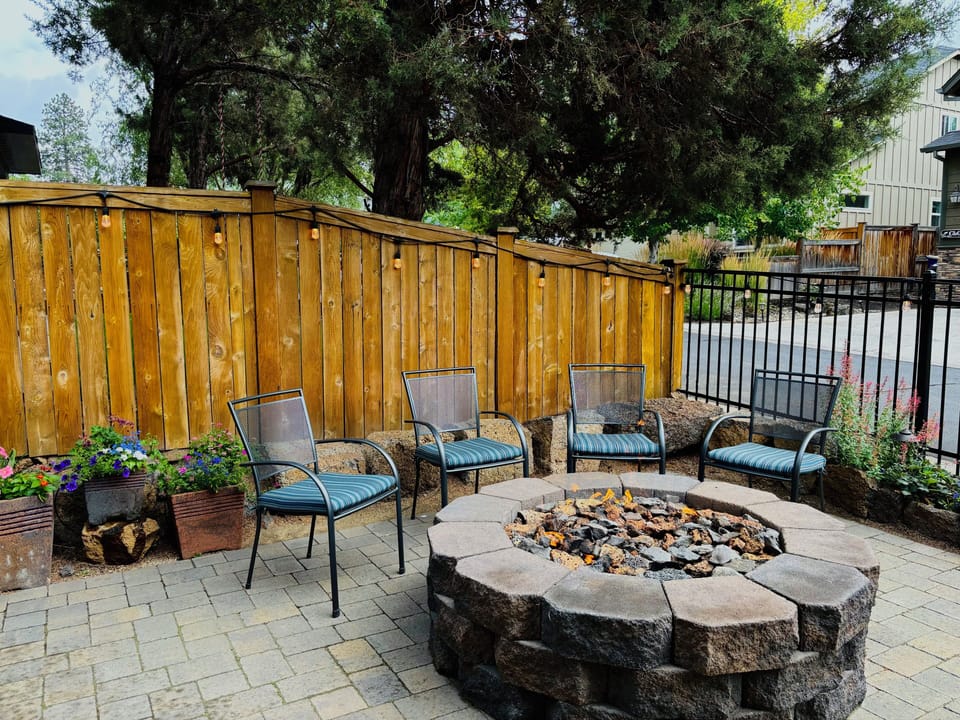 Backyard with Gas Firepit and mood lighting