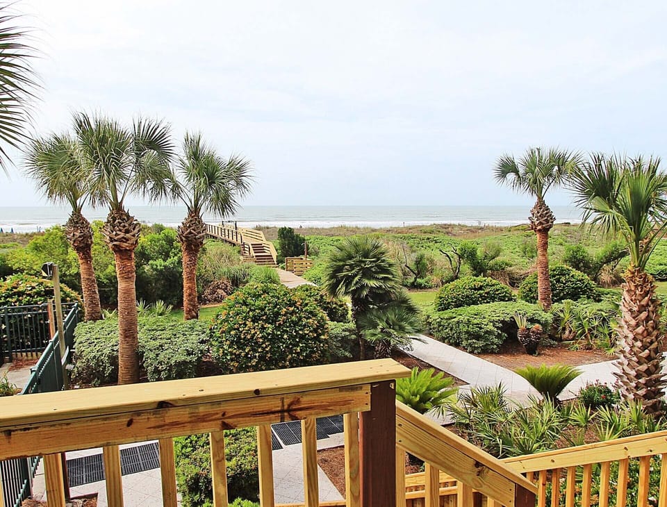 View from private porch. Direct stair access off of porch to the boardwalk/pool