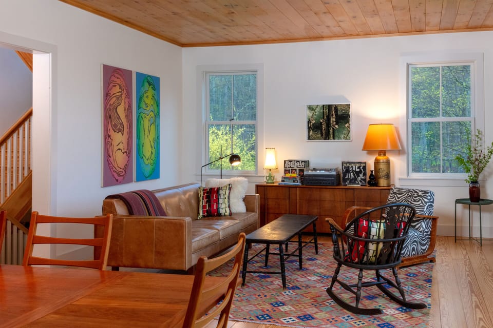 View of the living room from our kitchen; windows face both west and north.