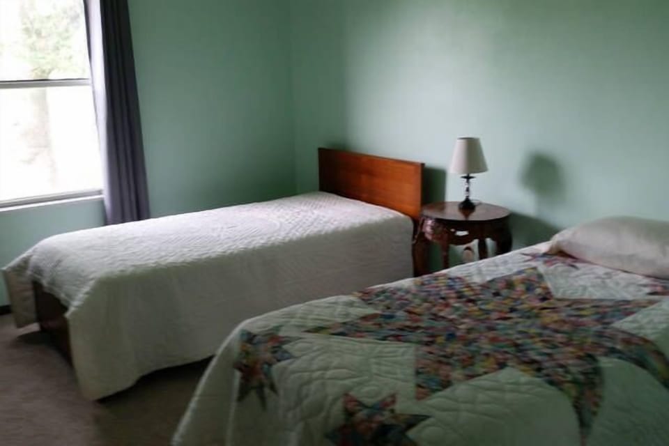Bedroom #1: Starburst room with two twin beds.