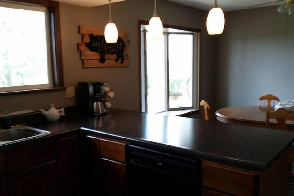Newly remolded kitchen with a dining room table for 6.
