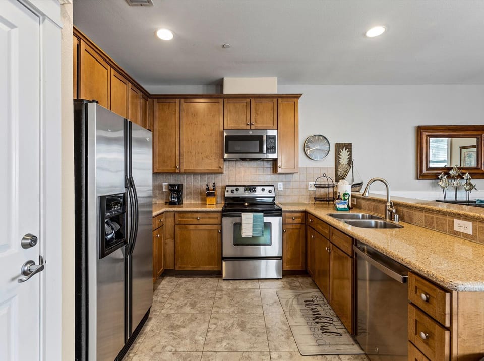 Fully equipped kitchen with stainless steel appliances
