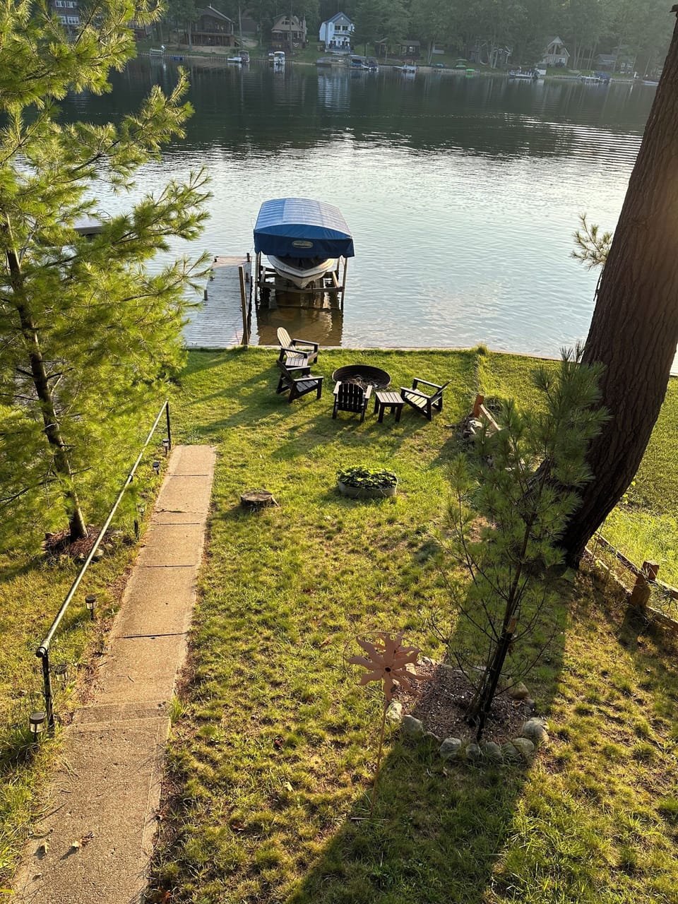 Lakeside view with firepit. Firewood is provided.