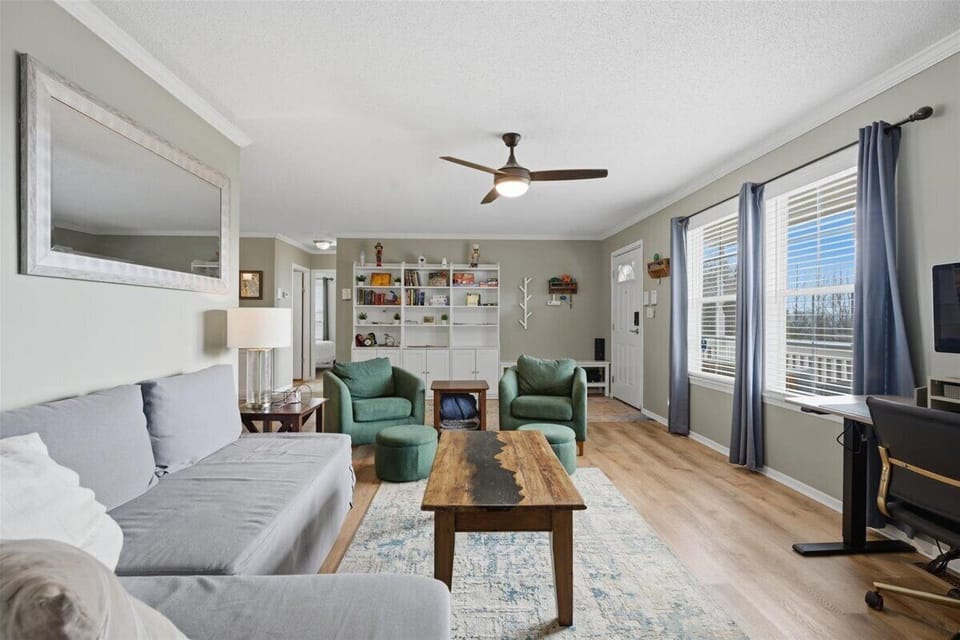 Comfortable living room with a pull-out couch and plenty. 