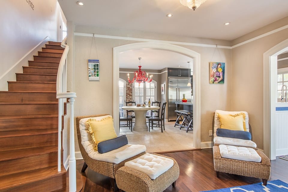 Unwind in this cozy corner reading nook—perfect for relaxing with a book after a beach day or scenic hike.
