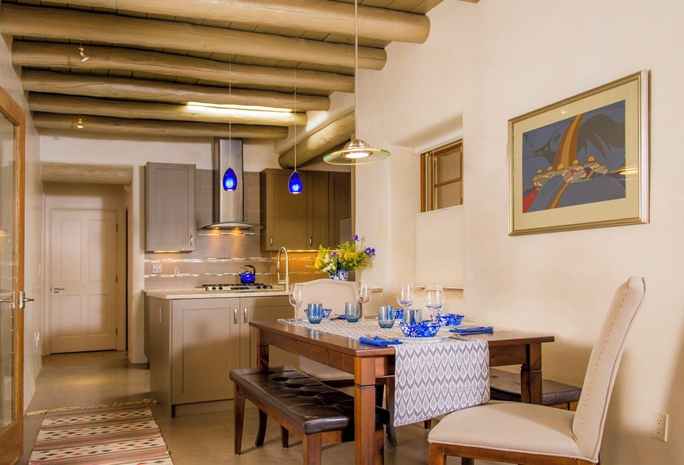 View from living room through dining space into kitchen
