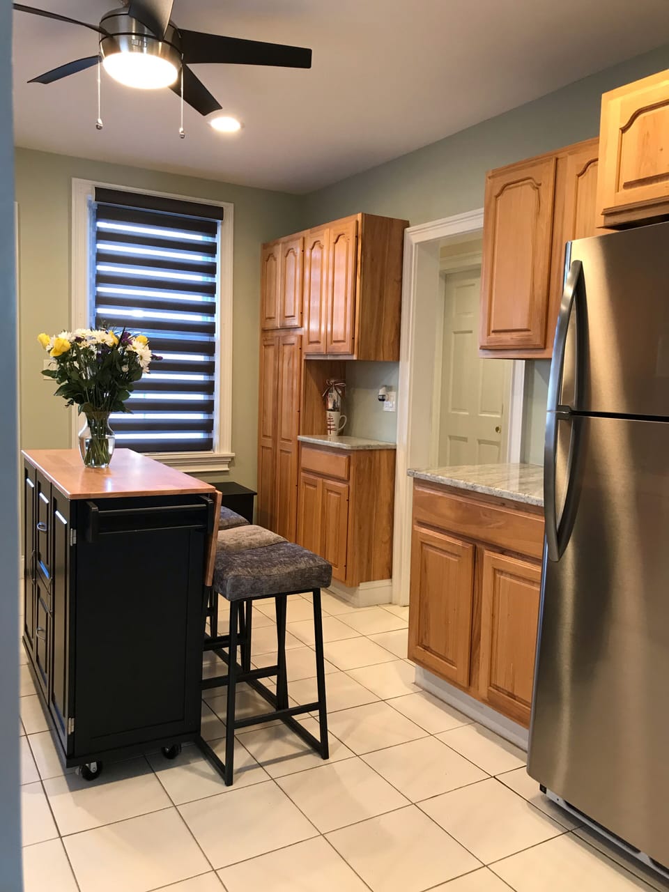 View of Kitchen refrigerator wall & coffee area