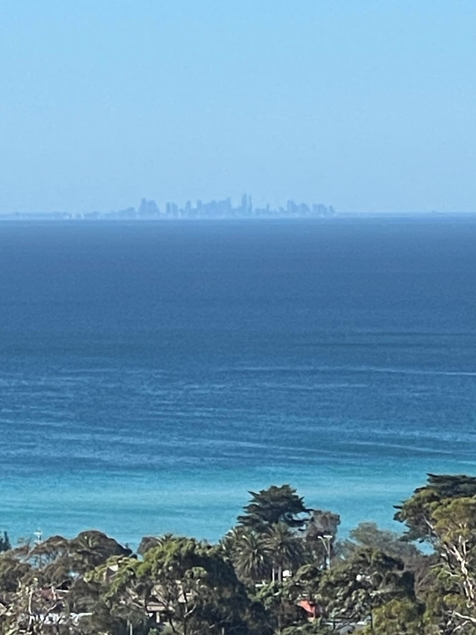 Views of Melbourne skyline from balcony