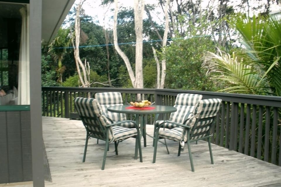 Large sunny north and west facing deck at edge of Forest and Bird reserve.