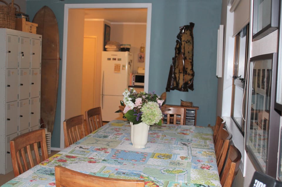 Large dining table and lockers full of games/puzzles. 