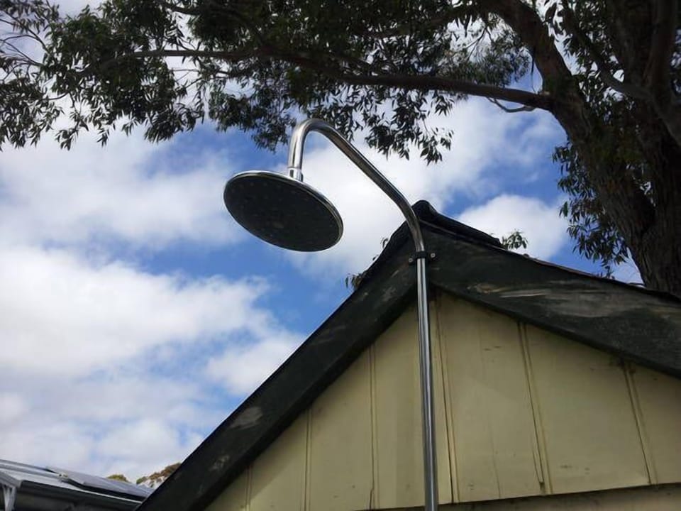 outdoor shower to rinse off after the beach