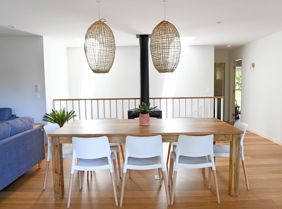 Dining with freestanding Escea Fireplace