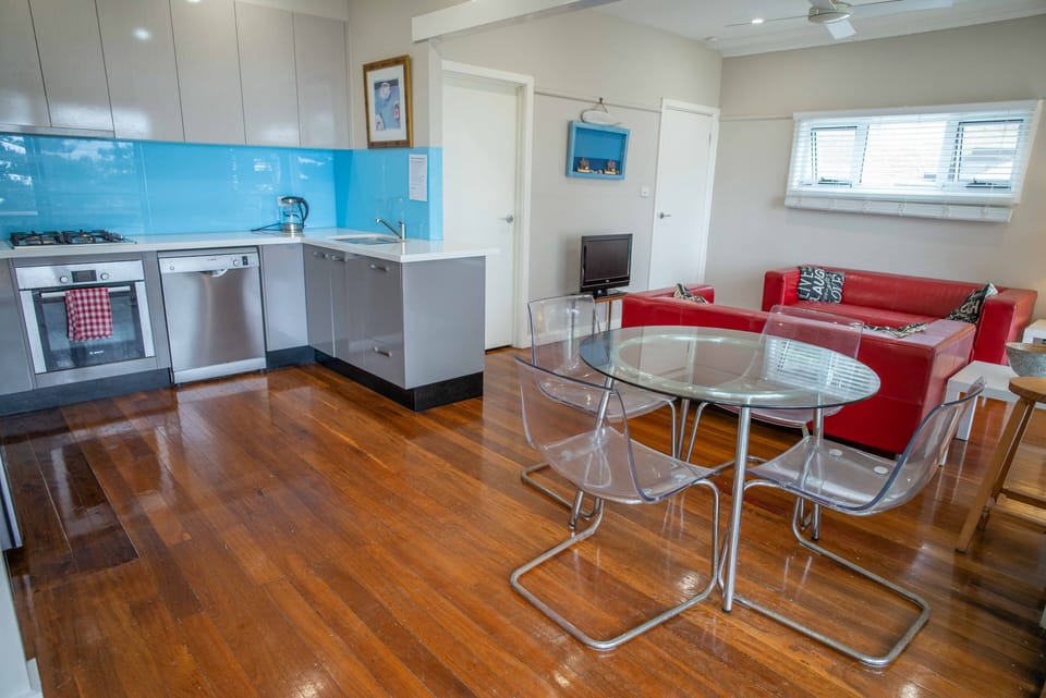 Open plan, kitchen, dining and living.