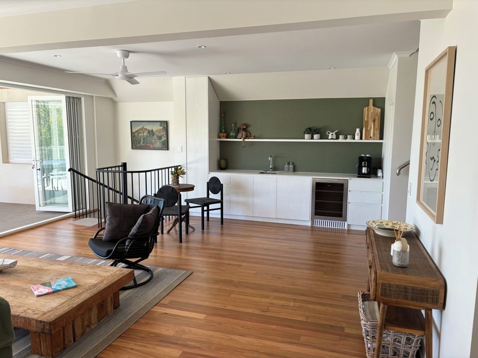 Wet bar with coffee machine, frig, dishwasher, etc on Mid level