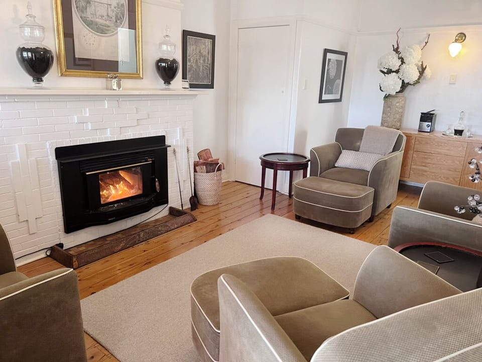 Lounge with fireplace and tv