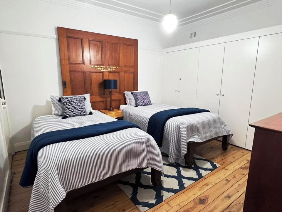 Bedroom 2 with two king single beds