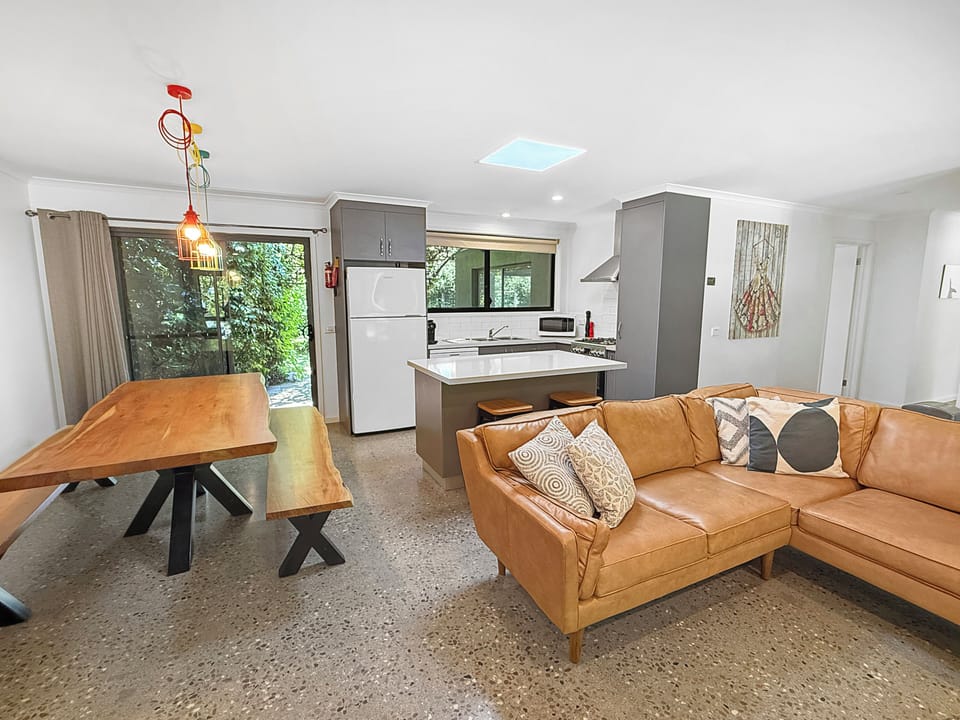 Open plan living surrounded by peaceful garden views