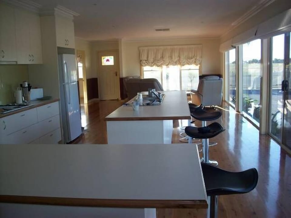 kitchen with bench seating looking towards family area
