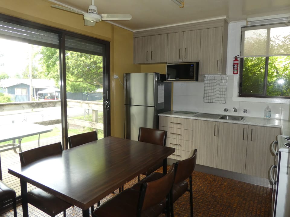 Dining area with double glazed doors to sun deck can seat up to 10