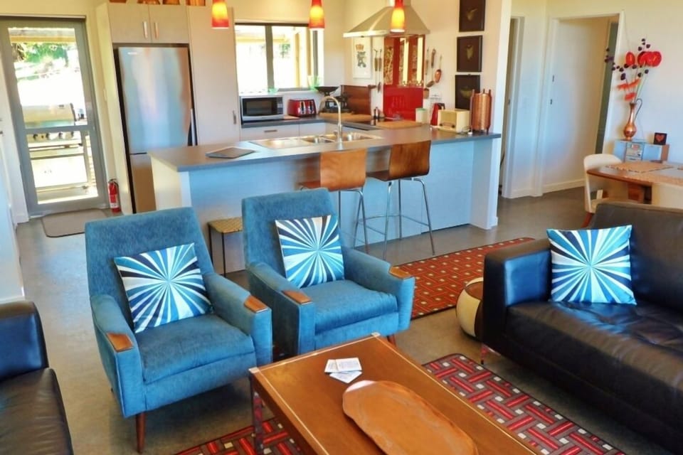 New home yet retro-theme large lounge. Views - valley, farmland with sea glimpse