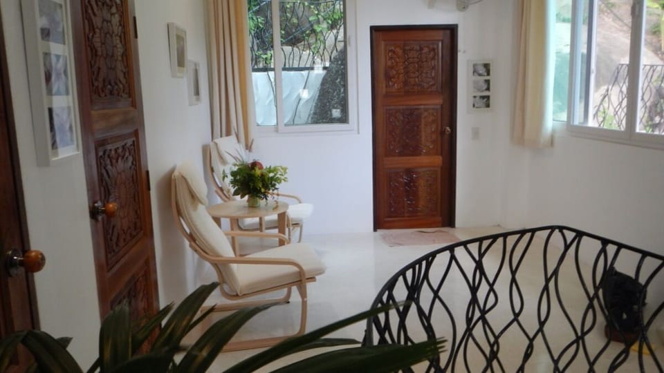 The "Gardenia" villa second floor foyer and reading room...
